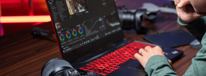 professional using a laptop at his workstation